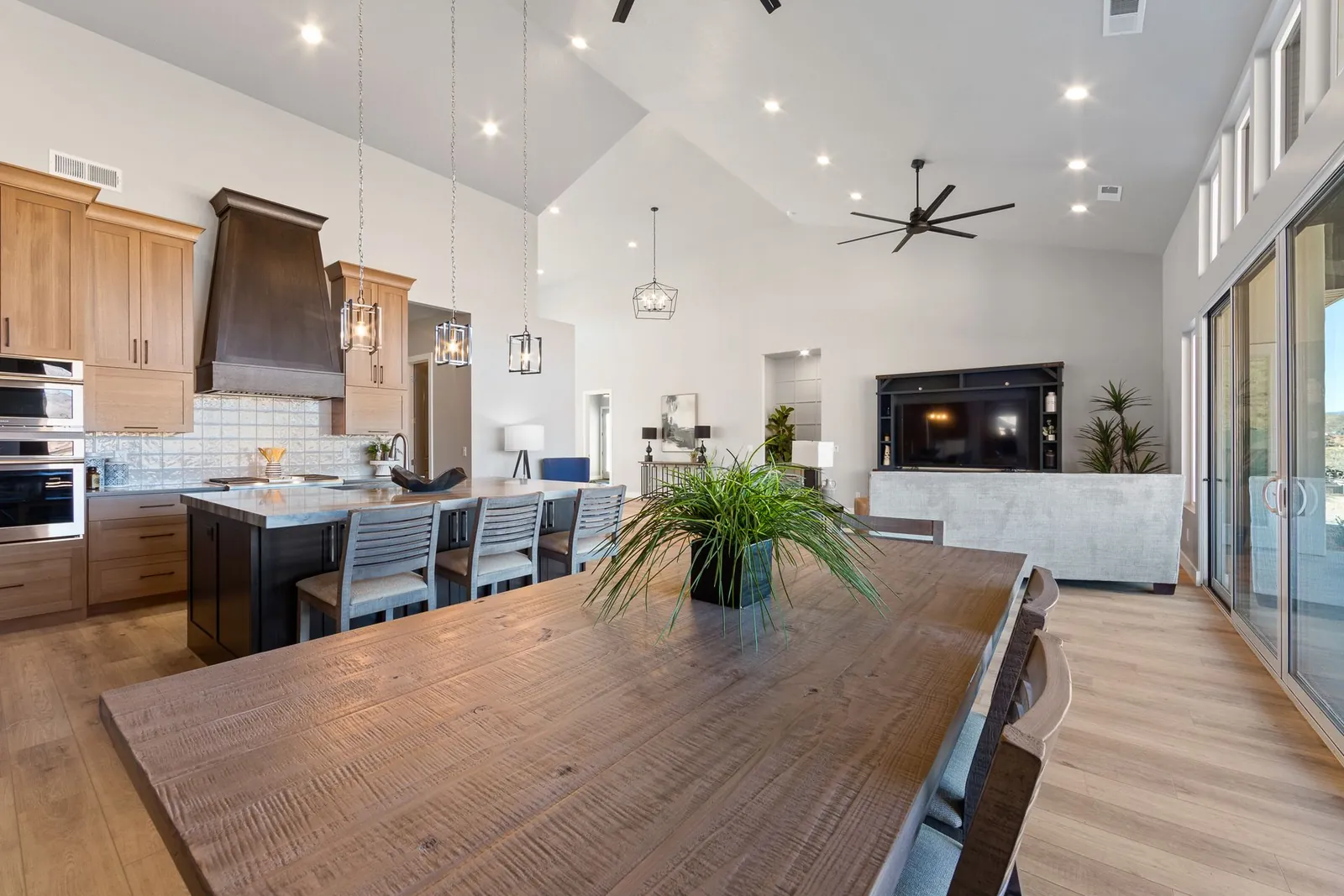Kitchen and dining area under a vaulted ceiling