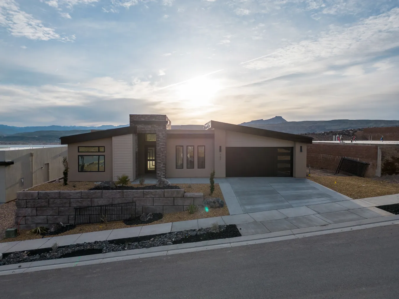 Modern single-story home at sunset