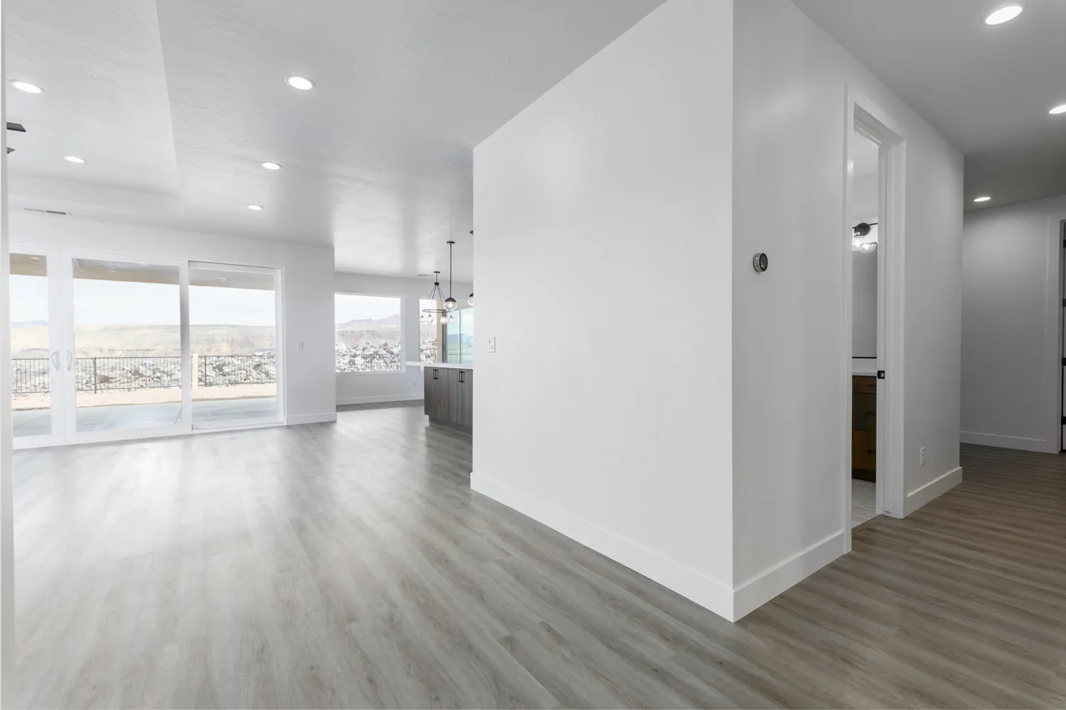 Great room with a wall of sliding doors