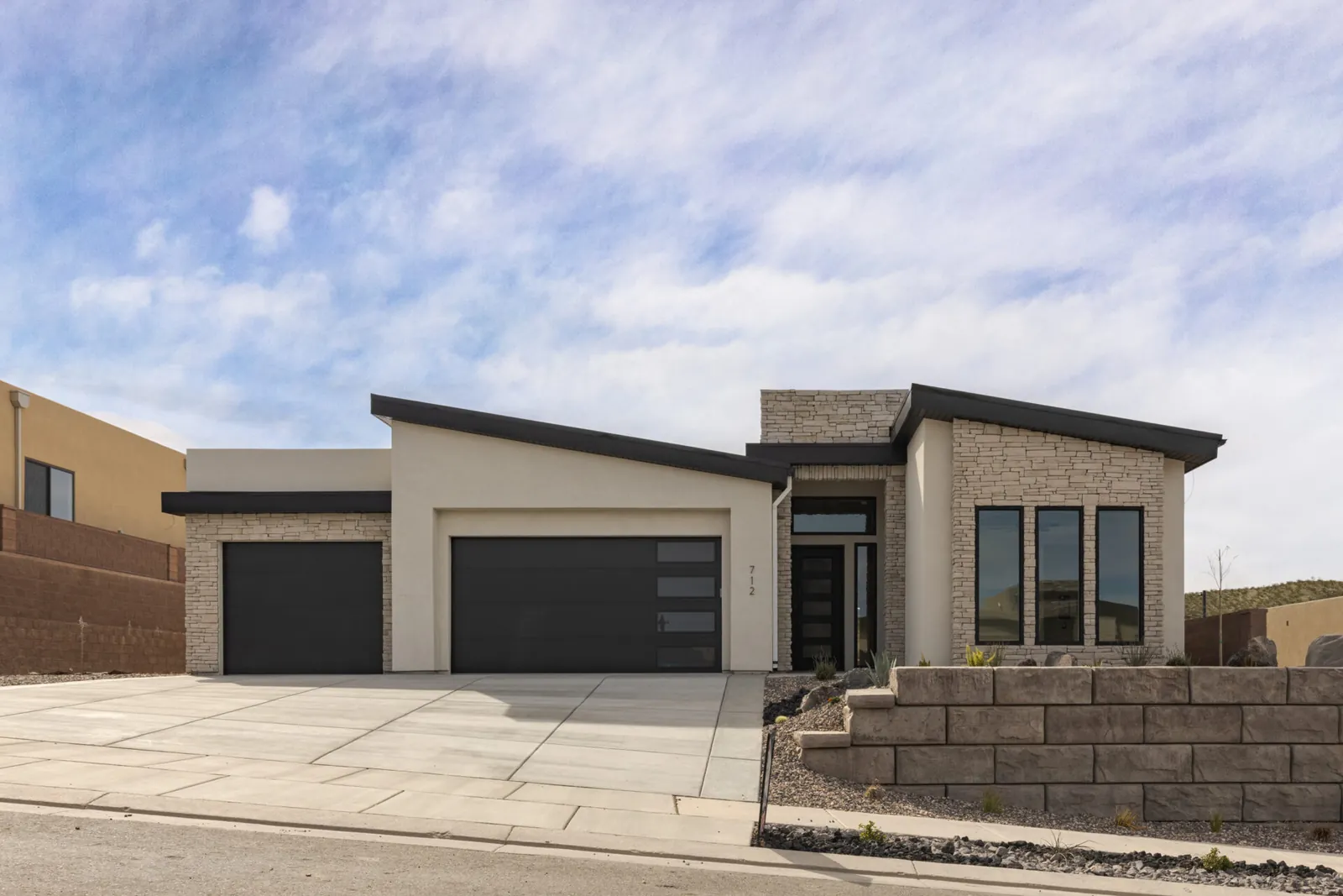 Modern single-story home with two garage doors