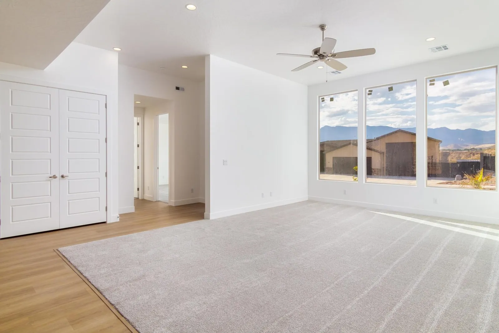 Great room with a row of windows toward the mountains