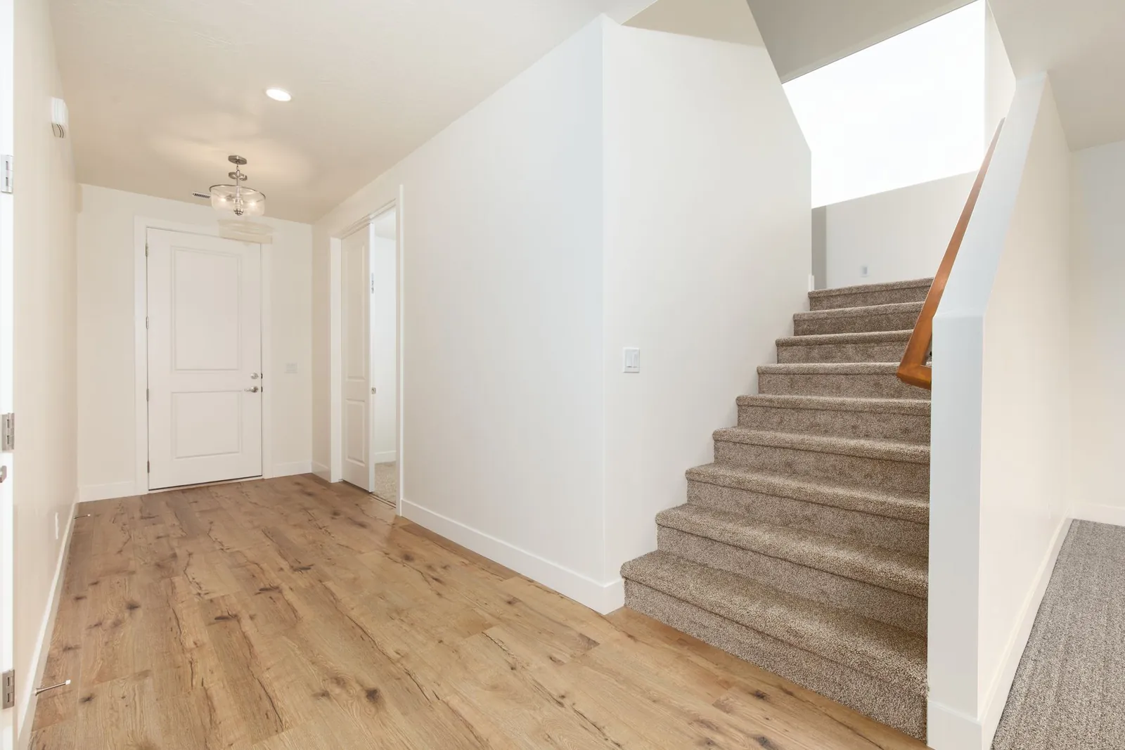 Stairway beside the front entry