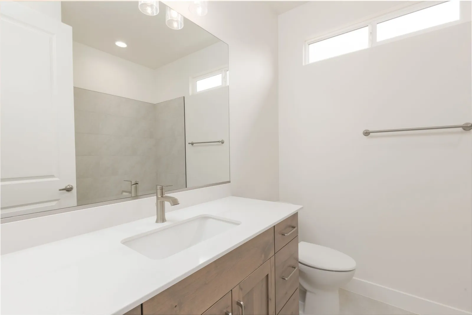 Bathroom vanity with a tiled shower