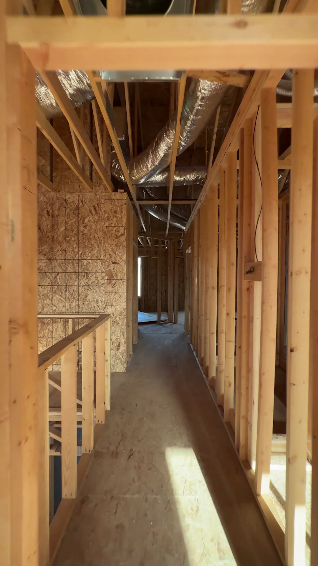 Inside a home while it is framed, before the drywall goes up