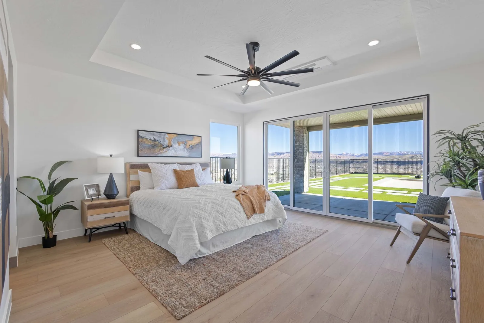 Primary bedroom with sliding doors to the patio